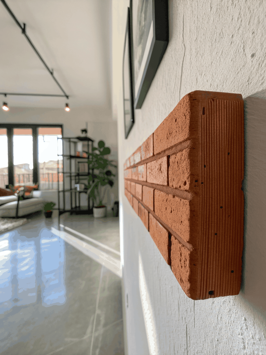 Architectural shadow play on a textured clay wall